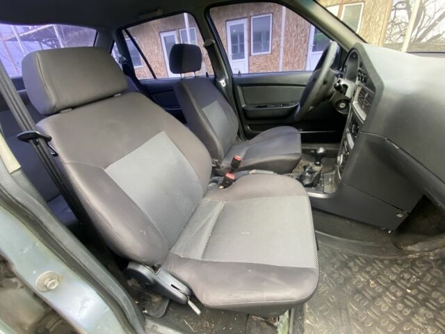 Синій Деу Нексія, об'ємом двигуна 1.6 л та пробігом 204 тис. км за 1350 $, фото 16 на Automoto.ua