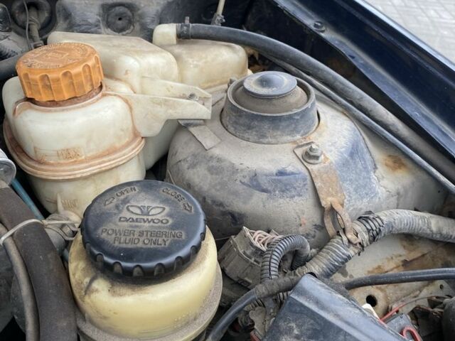 Синій Деу Нексія, об'ємом двигуна 1.5 л та пробігом 244 тис. км за 699 $, фото 14 на Automoto.ua