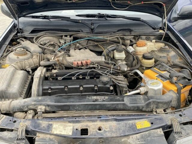 Синій Деу Нексія, об'ємом двигуна 1.5 л та пробігом 244 тис. км за 699 $, фото 10 на Automoto.ua