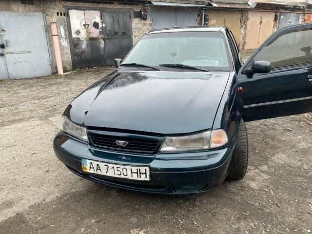 Зеленый Дэу Нексия, объемом двигателя 1.5 л и пробегом 208 тыс. км за 1300 $, фото 2 на Automoto.ua