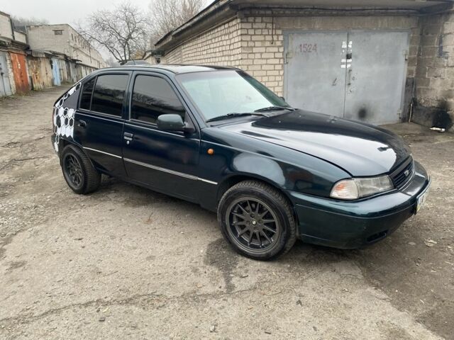 Зеленый Дэу Нексия, объемом двигателя 1.5 л и пробегом 208 тыс. км за 1300 $, фото 8 на Automoto.ua