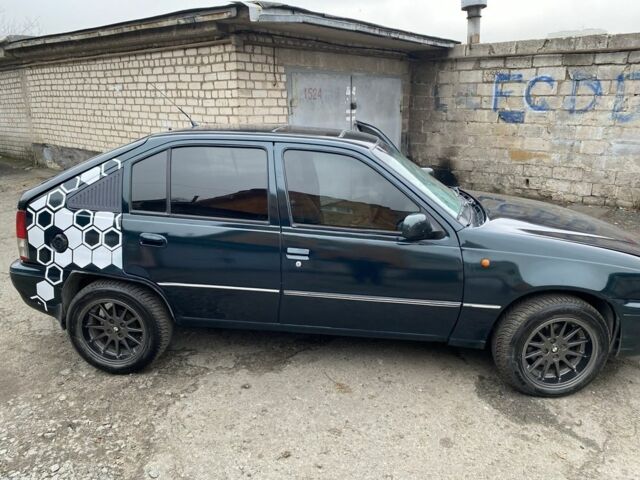 Зеленый Дэу Нексия, объемом двигателя 1.5 л и пробегом 208 тыс. км за 1300 $, фото 1 на Automoto.ua