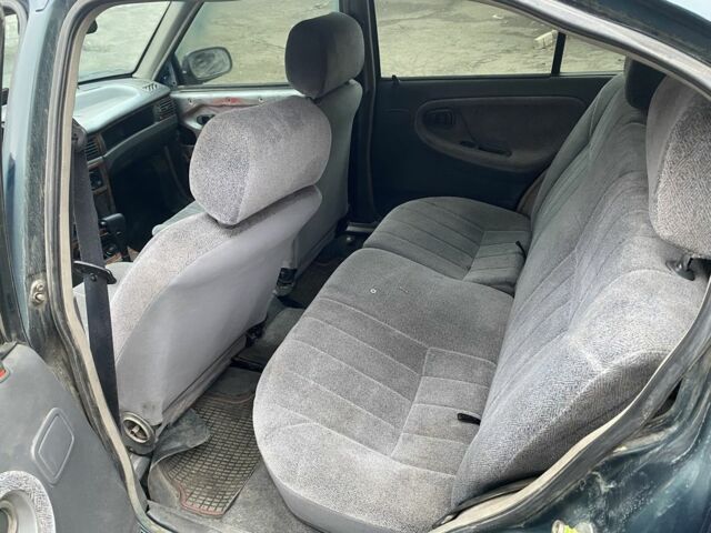 Зеленый Дэу Нексия, объемом двигателя 1.5 л и пробегом 208 тыс. км за 1300 $, фото 6 на Automoto.ua