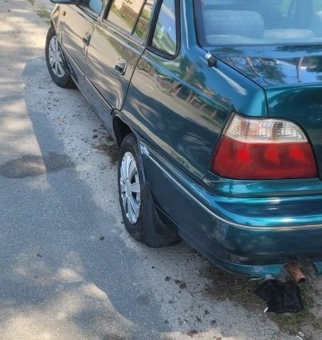 Зелений Деу Нексія, об'ємом двигуна 1.5 л та пробігом 222 тис. км за 800 $, фото 6 на Automoto.ua