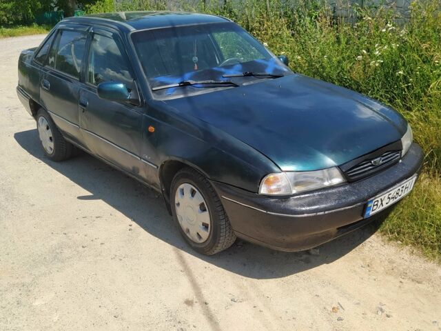Зеленый Дэу Нексия, объемом двигателя 1.5 л и пробегом 2 тыс. км за 890 $, фото 2 на Automoto.ua