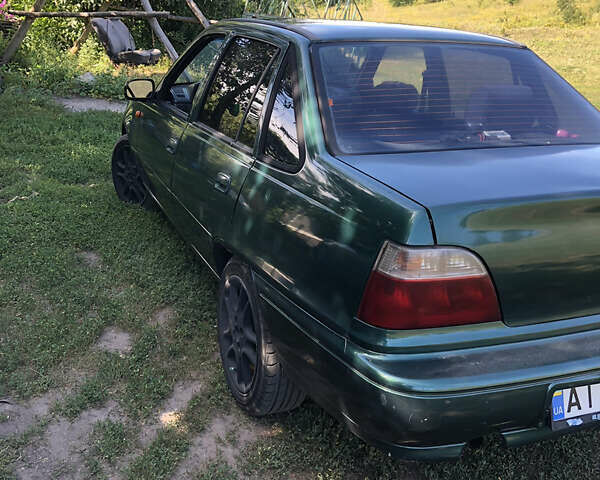 Зеленый Дэу Нексия, объемом двигателя 1.5 л и пробегом 470 тыс. км за 1100 $, фото 3 на Automoto.ua