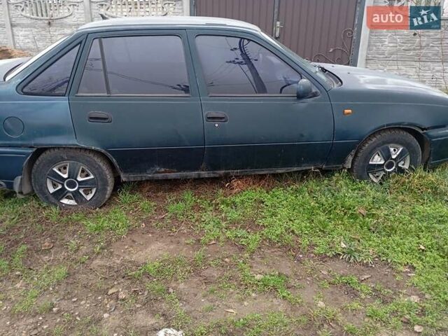 Зеленый Дэу Нексия, объемом двигателя 1.5 л и пробегом 300 тыс. км за 591 $, фото 2 на Automoto.ua