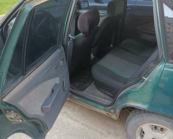 Зелений Деу Нексія, об'ємом двигуна 1.6 л та пробігом 340 тис. км за 850 $, фото 7 на Automoto.ua
