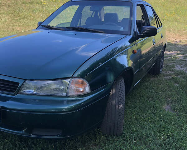 Зеленый Дэу Нексия, объемом двигателя 1.5 л и пробегом 470 тыс. км за 1100 $, фото 4 на Automoto.ua