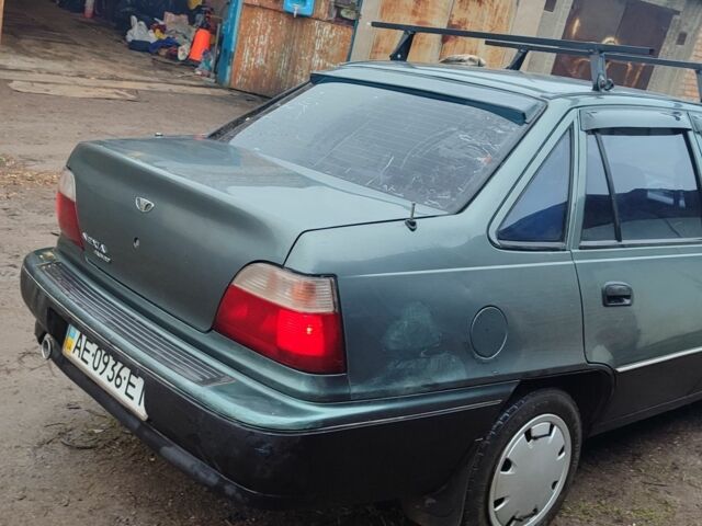 Зелений Деу Нексія, об'ємом двигуна 1 л та пробігом 350 тис. км за 854 $, фото 2 на Automoto.ua