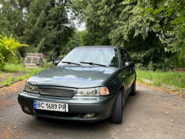 Зелений Деу Нексія, об'ємом двигуна 1.5 л та пробігом 290 тис. км за 999 $, фото 2 на Automoto.ua