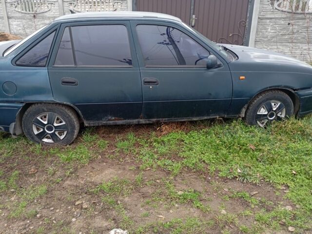 Зеленый Дэу Нексия, объемом двигателя 1.5 л и пробегом 300 тыс. км за 591 $, фото 3 на Automoto.ua