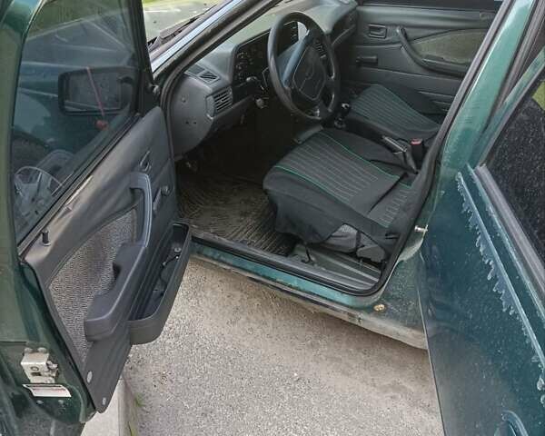 Зелений Деу Нексія, об'ємом двигуна 1.6 л та пробігом 340 тис. км за 850 $, фото 6 на Automoto.ua