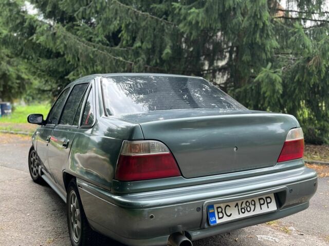 Зелений Деу Нексія, об'ємом двигуна 1.5 л та пробігом 290 тис. км за 999 $, фото 3 на Automoto.ua