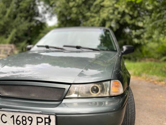 Зелений Деу Нексія, об'ємом двигуна 1.5 л та пробігом 290 тис. км за 999 $, фото 1 на Automoto.ua