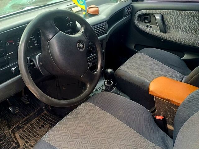 Зеленый Дэу Нексия, объемом двигателя 1.5 л и пробегом 331 тыс. км за 2300 $, фото 6 на Automoto.ua