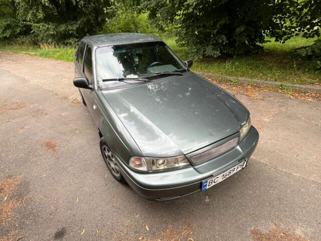 Зелений Деу Нексія, об'ємом двигуна 1.5 л та пробігом 290 тис. км за 999 $, фото 5 на Automoto.ua