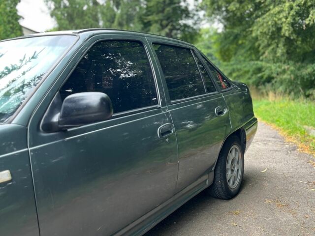 Зелений Деу Нексія, об'ємом двигуна 1.5 л та пробігом 290 тис. км за 999 $, фото 10 на Automoto.ua