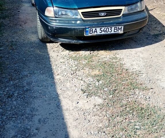 Зелений Деу Нексія, об'ємом двигуна 1.5 л та пробігом 1000 тис. км за 999 $, фото 2 на Automoto.ua
