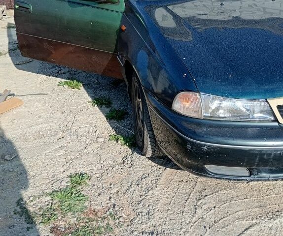 Зелений Деу Нексія, об'ємом двигуна 1.5 л та пробігом 1000 тис. км за 999 $, фото 6 на Automoto.ua
