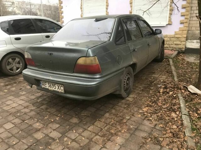 Зеленый Дэу Нексия, объемом двигателя 1.5 л и пробегом 232 тыс. км за 1018 $, фото 3 на Automoto.ua