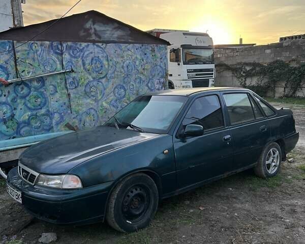 Зелений Деу Нексія, об'ємом двигуна 1.5 л та пробігом 200 тис. км за 899 $, фото 2 на Automoto.ua