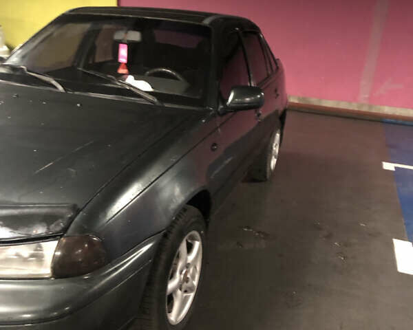 Зеленый Дэу Нексия, объемом двигателя 1.5 л и пробегом 370 тыс. км за 900 $, фото 3 на Automoto.ua