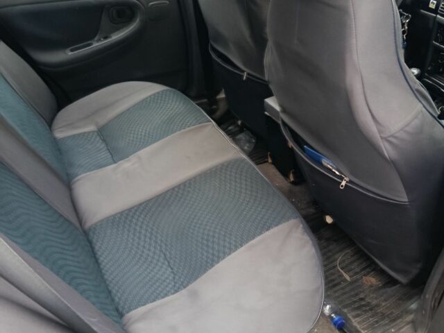 Зеленый Дэу Нексия, объемом двигателя 1.5 л и пробегом 330 тыс. км за 1000 $, фото 3 на Automoto.ua