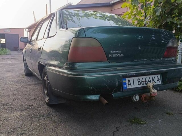 Зеленый Дэу Нексия, объемом двигателя 1.5 л и пробегом 300 тыс. км за 1000 $, фото 4 на Automoto.ua