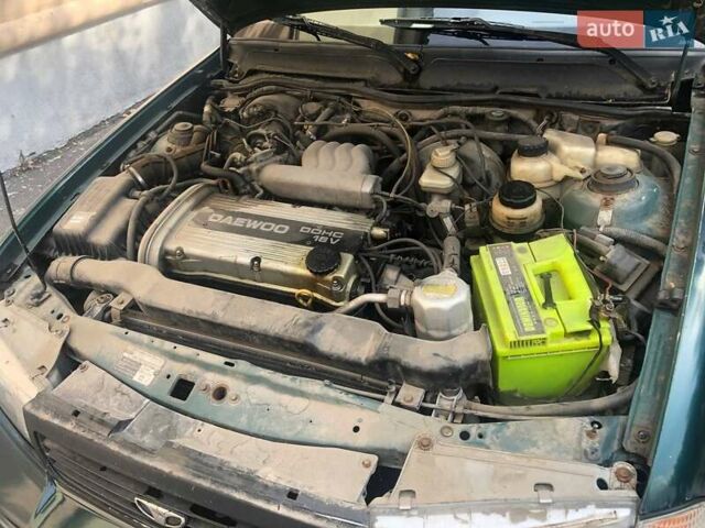Зеленый Дэу Нексия, объемом двигателя 1.5 л и пробегом 252 тыс. км за 1300 $, фото 3 на Automoto.ua
