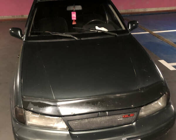 Зеленый Дэу Нексия, объемом двигателя 1.5 л и пробегом 370 тыс. км за 900 $, фото 2 на Automoto.ua