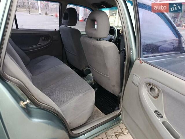 Зеленый Дэу Нексия, объемом двигателя 1.5 л и пробегом 119 тыс. км за 1799 $, фото 5 на Automoto.ua