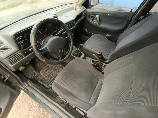 Зеленый Дэу Нексия, объемом двигателя 1.5 л и пробегом 119 тыс. км за 1300 $, фото 7 на Automoto.ua