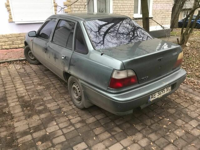 Зеленый Дэу Нексия, объемом двигателя 1.5 л и пробегом 232 тыс. км за 1018 $, фото 2 на Automoto.ua