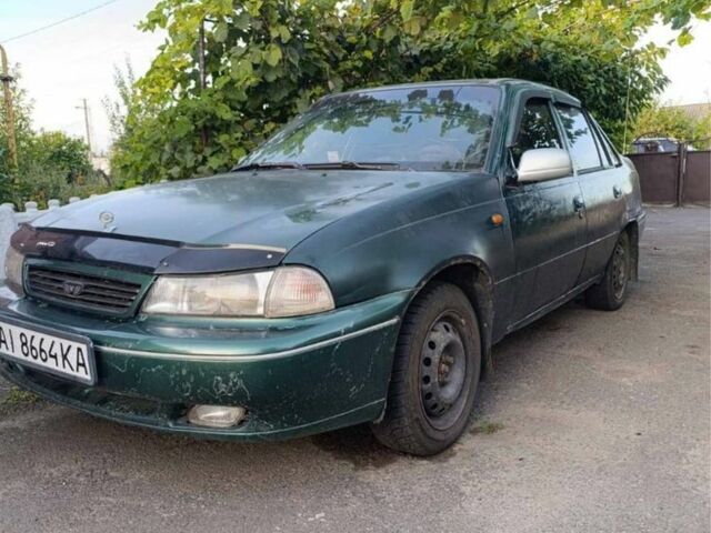 Зелений Деу Нексія, об'ємом двигуна 1.5 л та пробігом 300 тис. км за 850 $, фото 3 на Automoto.ua