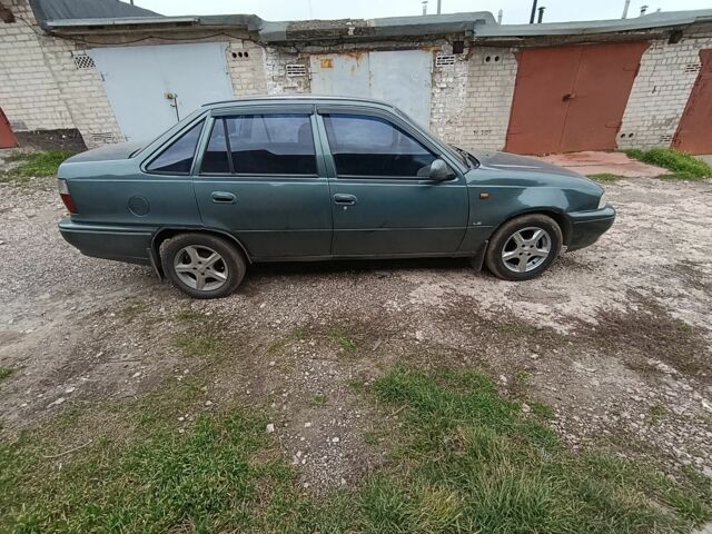 Зеленый Дэу Нексия, объемом двигателя 1.5 л и пробегом 119 тыс. км за 1300 $, фото 10 на Automoto.ua