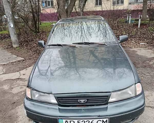 Зелений Деу Нексія, об'ємом двигуна 1.5 л та пробігом 330 тис. км за 1000 $, фото 5 на Automoto.ua