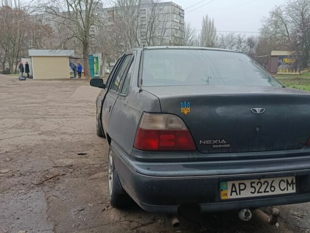 Зеленый Дэу Нексия, объемом двигателя 1.5 л и пробегом 330 тыс. км за 1000 $, фото 8 на Automoto.ua