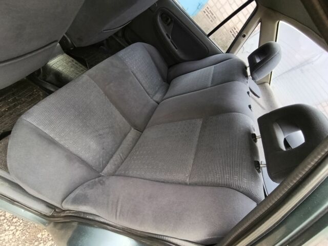 Зеленый Дэу Нексия, объемом двигателя 1.5 л и пробегом 119 тыс. км за 1300 $, фото 8 на Automoto.ua