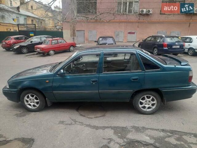 Зелений Деу Нексія, об'ємом двигуна 1.5 л та пробігом 258 тис. км за 2100 $, фото 2 на Automoto.ua