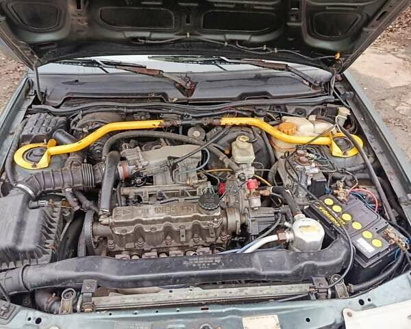 Зелений Деу Нексія, об'ємом двигуна 1.5 л та пробігом 330 тис. км за 1000 $, фото 8 на Automoto.ua