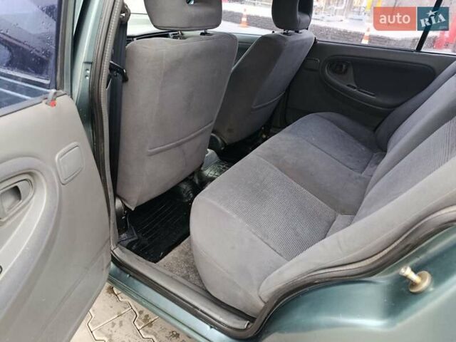 Зеленый Дэу Нексия, объемом двигателя 1.5 л и пробегом 119 тыс. км за 1799 $, фото 26 на Automoto.ua