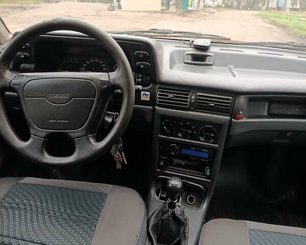 Зелений Деу Нексія, об'ємом двигуна 1.5 л та пробігом 330 тис. км за 1000 $, фото 1 на Automoto.ua