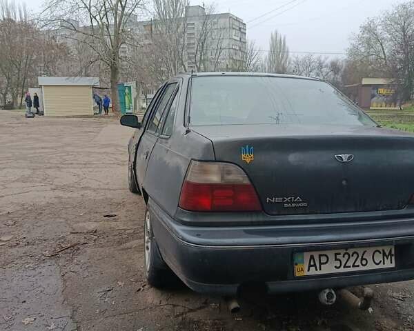 Зелений Деу Нексія, об'ємом двигуна 1.5 л та пробігом 330 тис. км за 1000 $, фото 7 на Automoto.ua