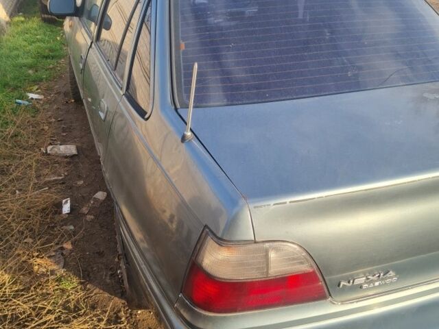 Зелений Деу Нексія, об'ємом двигуна 1.5 л та пробігом 200 тис. км за 800 $, фото 2 на Automoto.ua