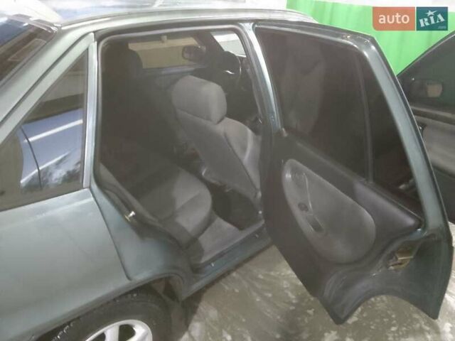 Зелений Деу Нексія, об'ємом двигуна 1.5 л та пробігом 150 тис. км за 3100 $, фото 9 на Automoto.ua