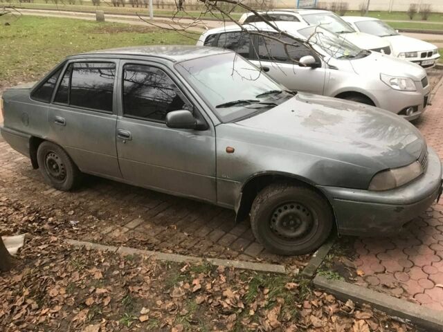 Зеленый Дэу Нексия, объемом двигателя 1.5 л и пробегом 232 тыс. км за 1018 $, фото 4 на Automoto.ua