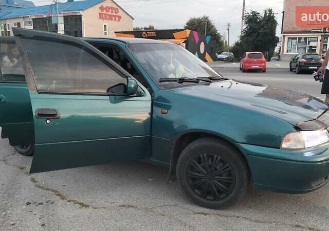 Зелений Деу Нексія, об'ємом двигуна 1.5 л та пробігом 300 тис. км за 1450 $, фото 4 на Automoto.ua