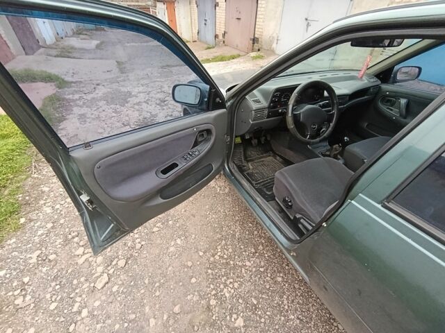 Зеленый Дэу Нексия, объемом двигателя 1.5 л и пробегом 119 тыс. км за 1300 $, фото 6 на Automoto.ua