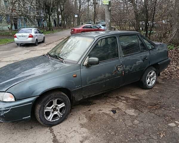 Зелений Деу Нексія, об'ємом двигуна 1.5 л та пробігом 330 тис. км за 1000 $, фото 6 на Automoto.ua